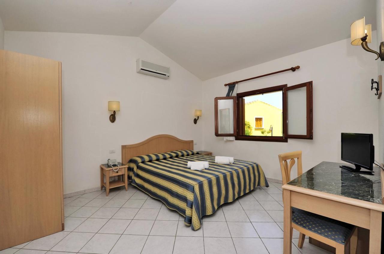 Hotel Cala Mirto บูโดนี ภายนอก รูปภาพ
