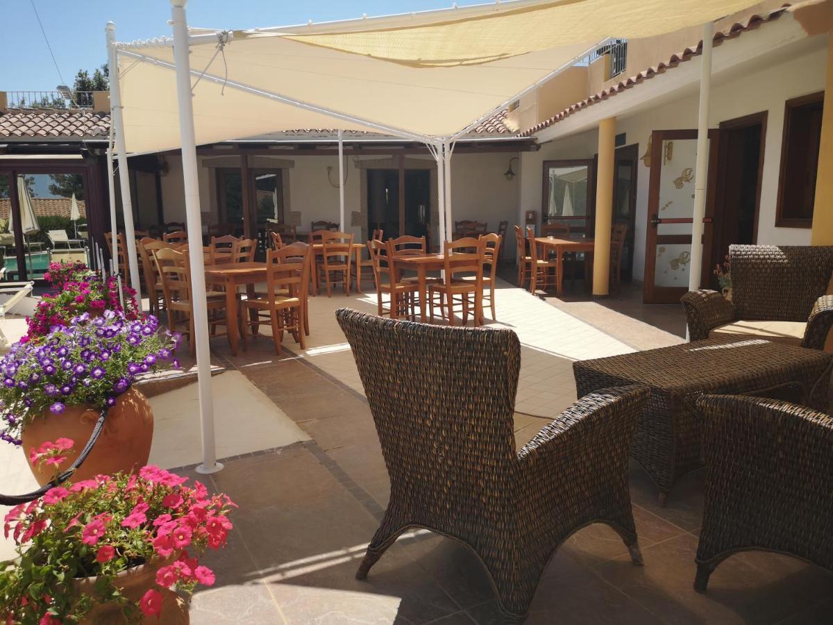 Hotel Cala Mirto บูโดนี ภายนอก รูปภาพ