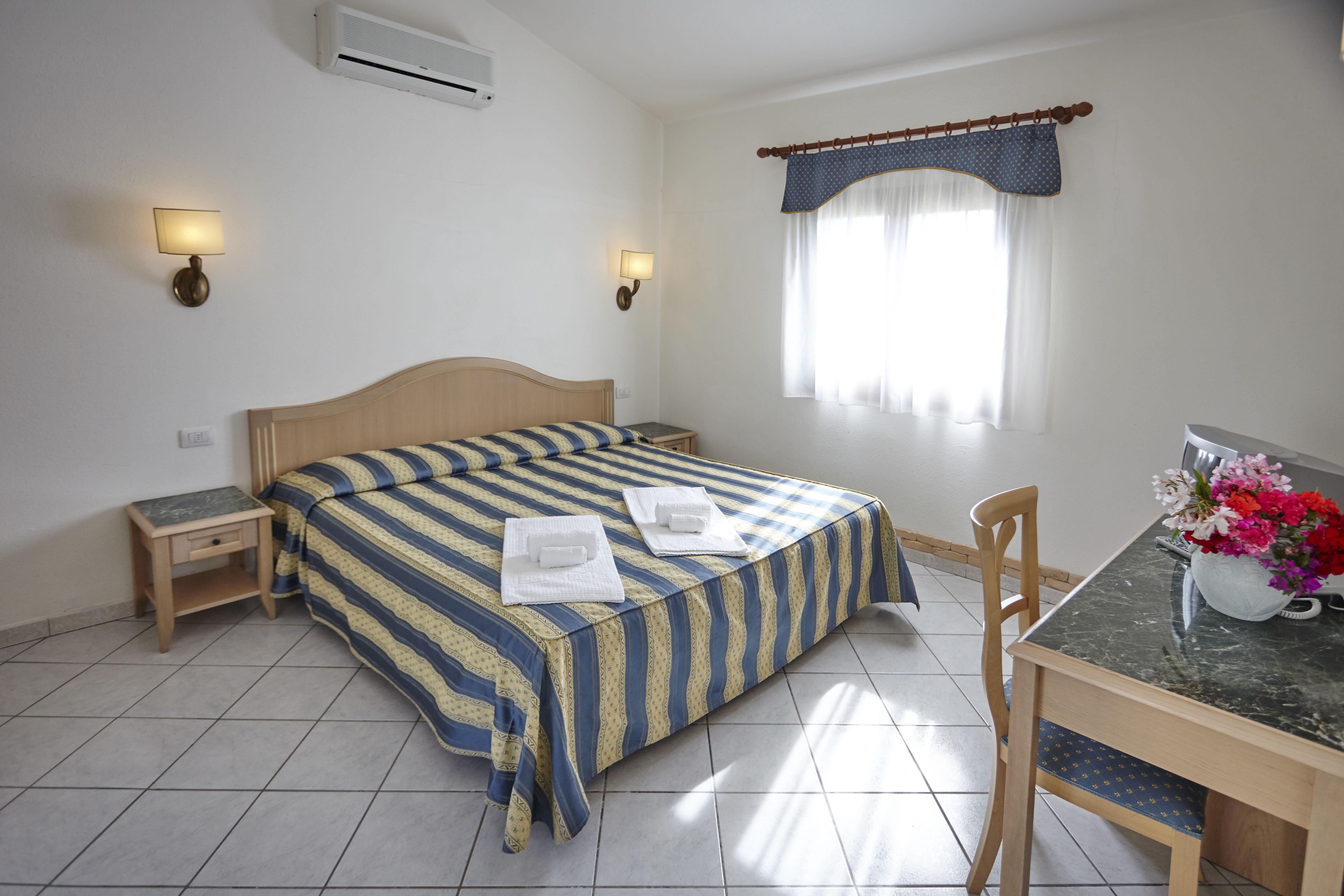 Hotel Cala Mirto บูโดนี ภายนอก รูปภาพ