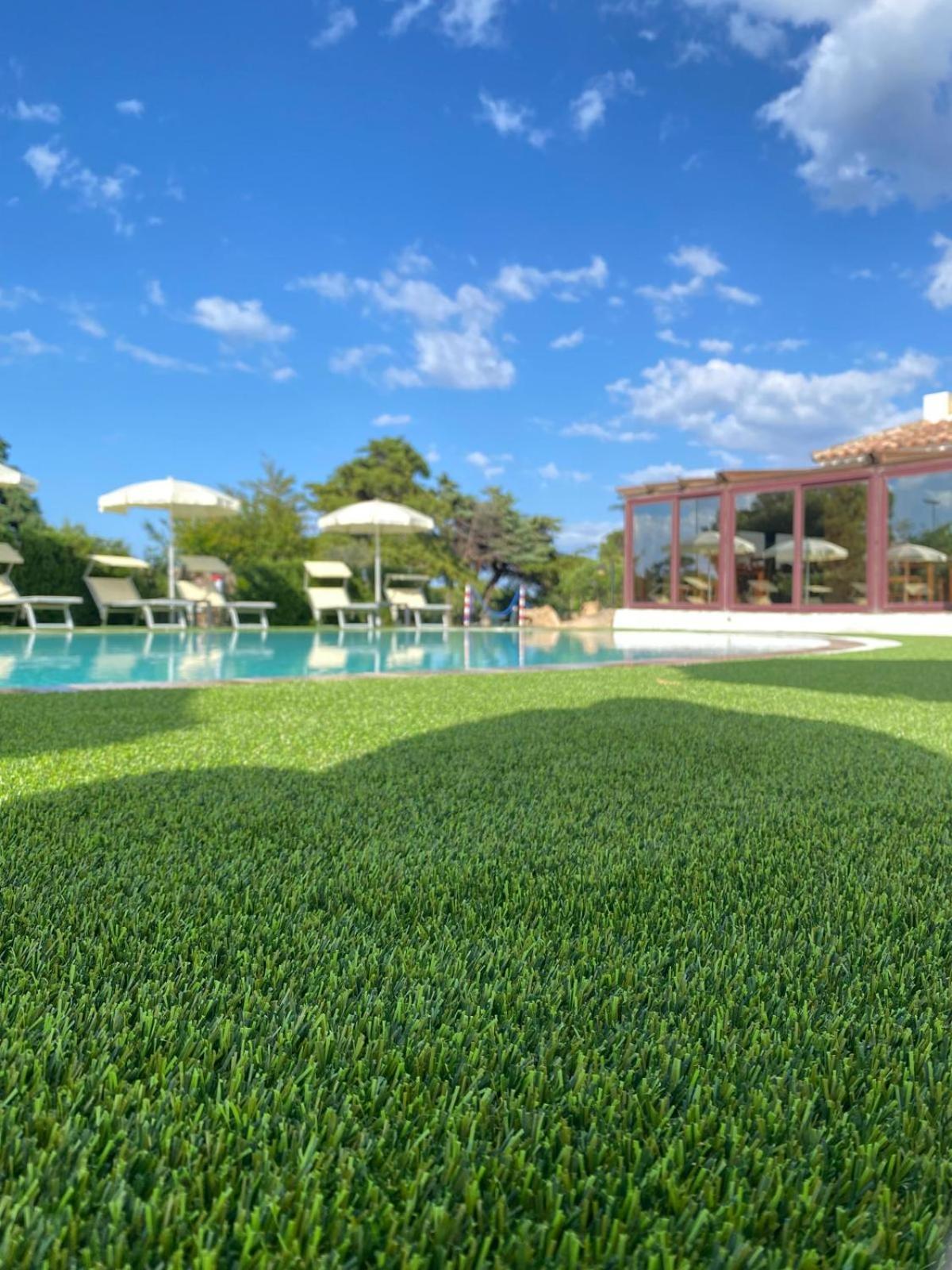 Hotel Cala Mirto บูโดนี ภายนอก รูปภาพ